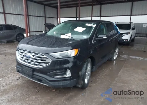 2022 Ford Edge Titanium z USA, uszkodzony, nr VIN 2FMPK4K92NBB06513